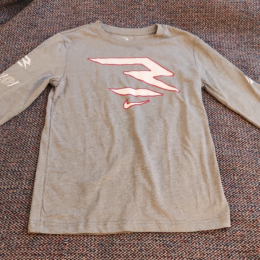 Boys Nike Gray Long Sleeve Kids Tee with White & Red Abstract Nike Logo Graphic